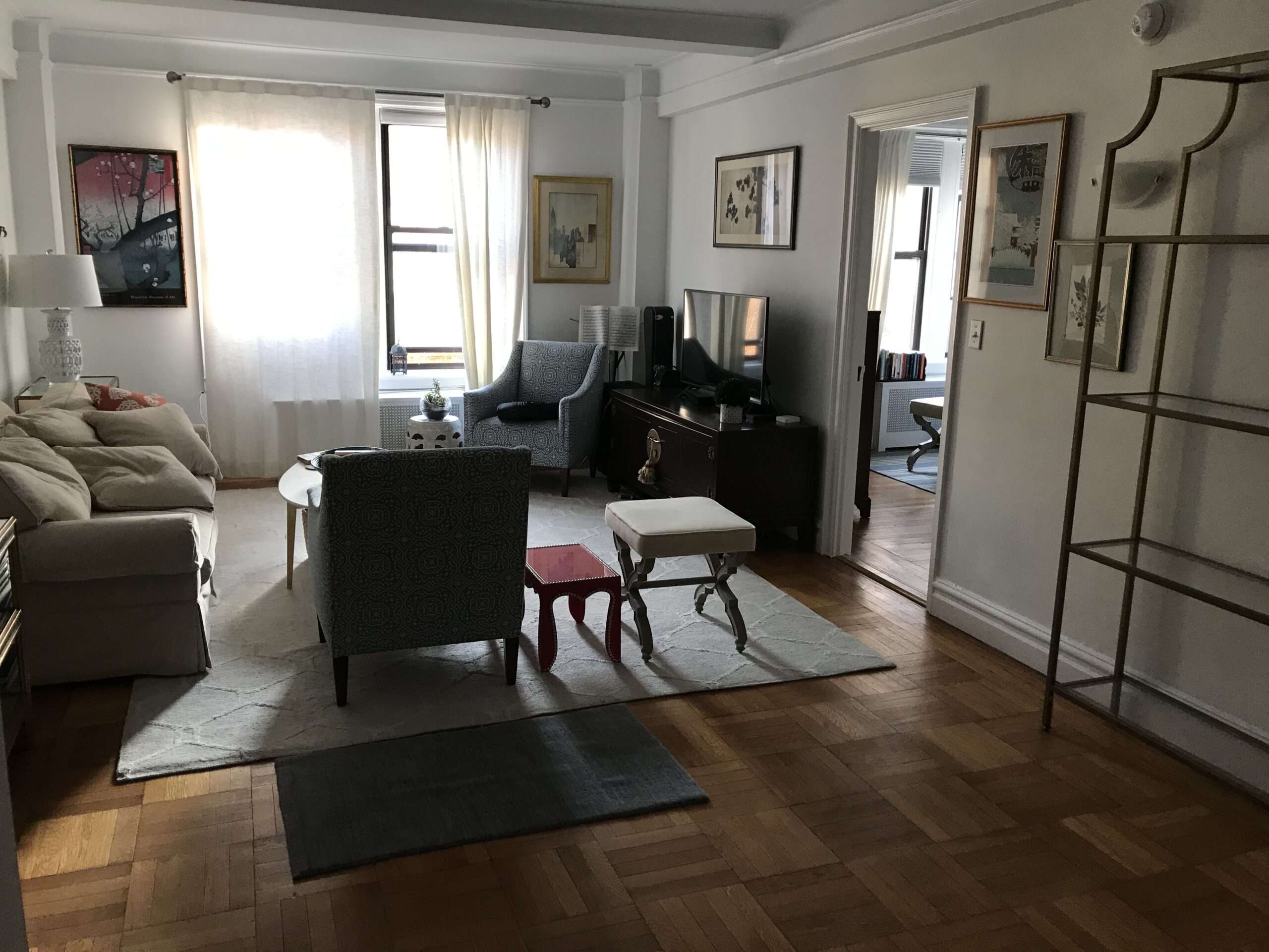 Freshly painted NYC apartment living room with clean white walls